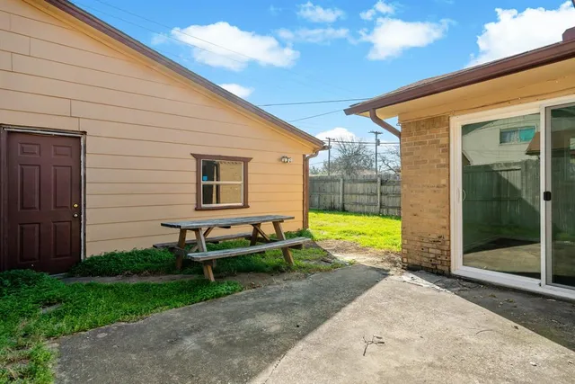 a house view with a garden space