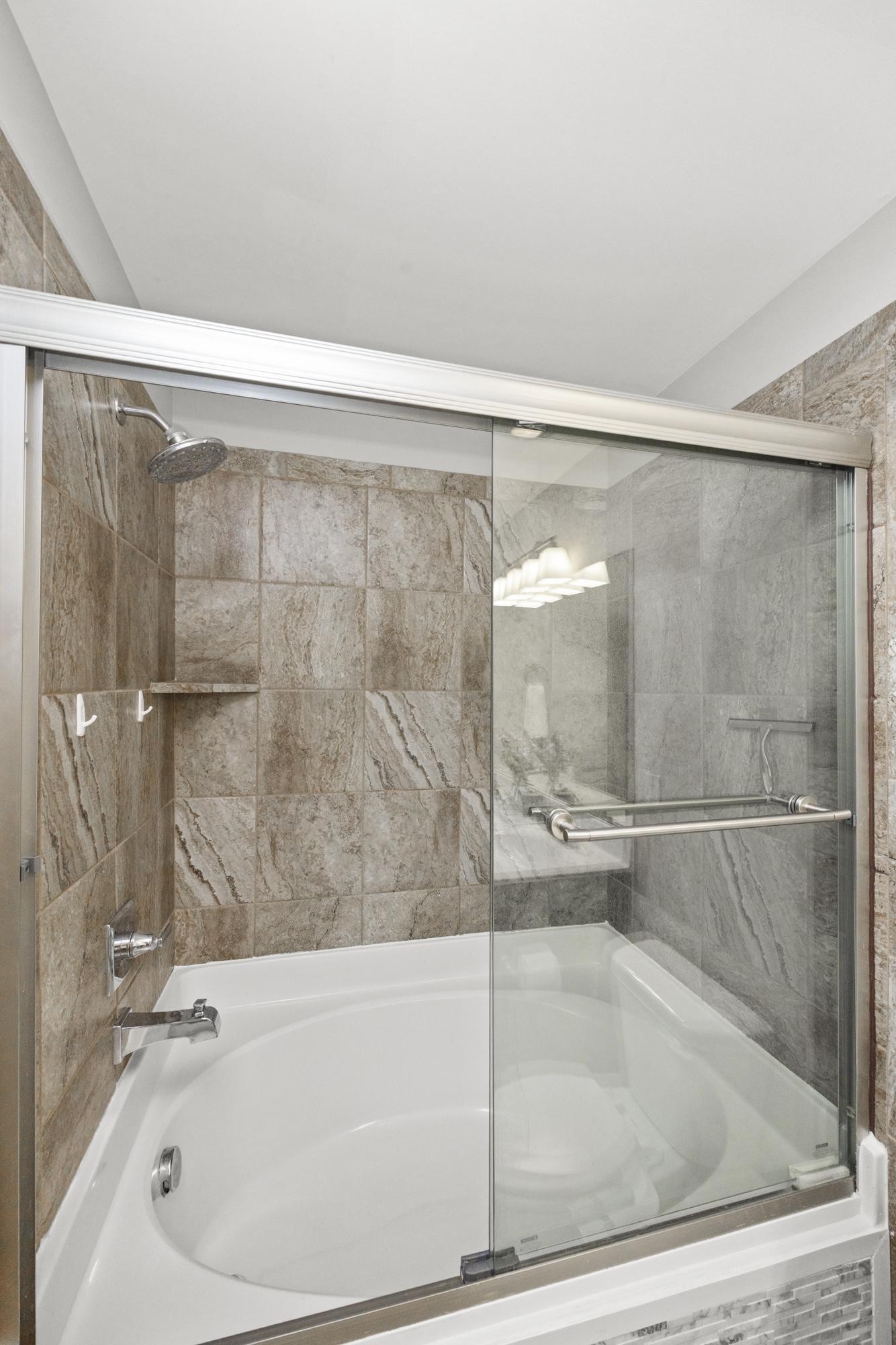 112 Bergen Drive Spring Hill, TN 37174 - Photo 27 of 37 a bathroom with a shower and a bath tub
