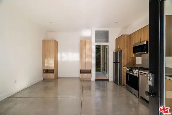 a view of a kitchen with a sink
