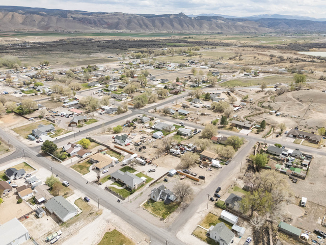 197 West 100 South Redmond, UT 84652 - Photo 38 of 41 Aerial view of residential area with a mountainous background