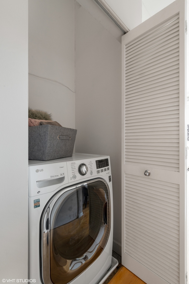 1301 West Madison Street, Unit 203 Chicago, IL 60607 - Photo 12 of 14 a utility room with dryer and washer