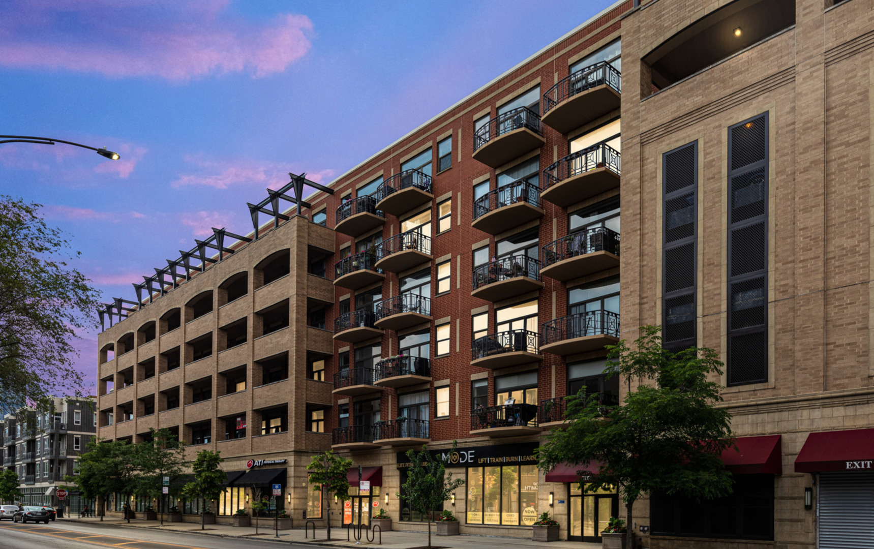 1301 West Madison Street, Unit 203 Chicago, IL 60607 - Photo 2 of 14 a view of a building with a street