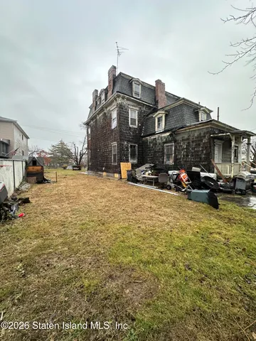 a view of a street with cars