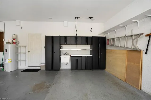 a utility room with cabinets