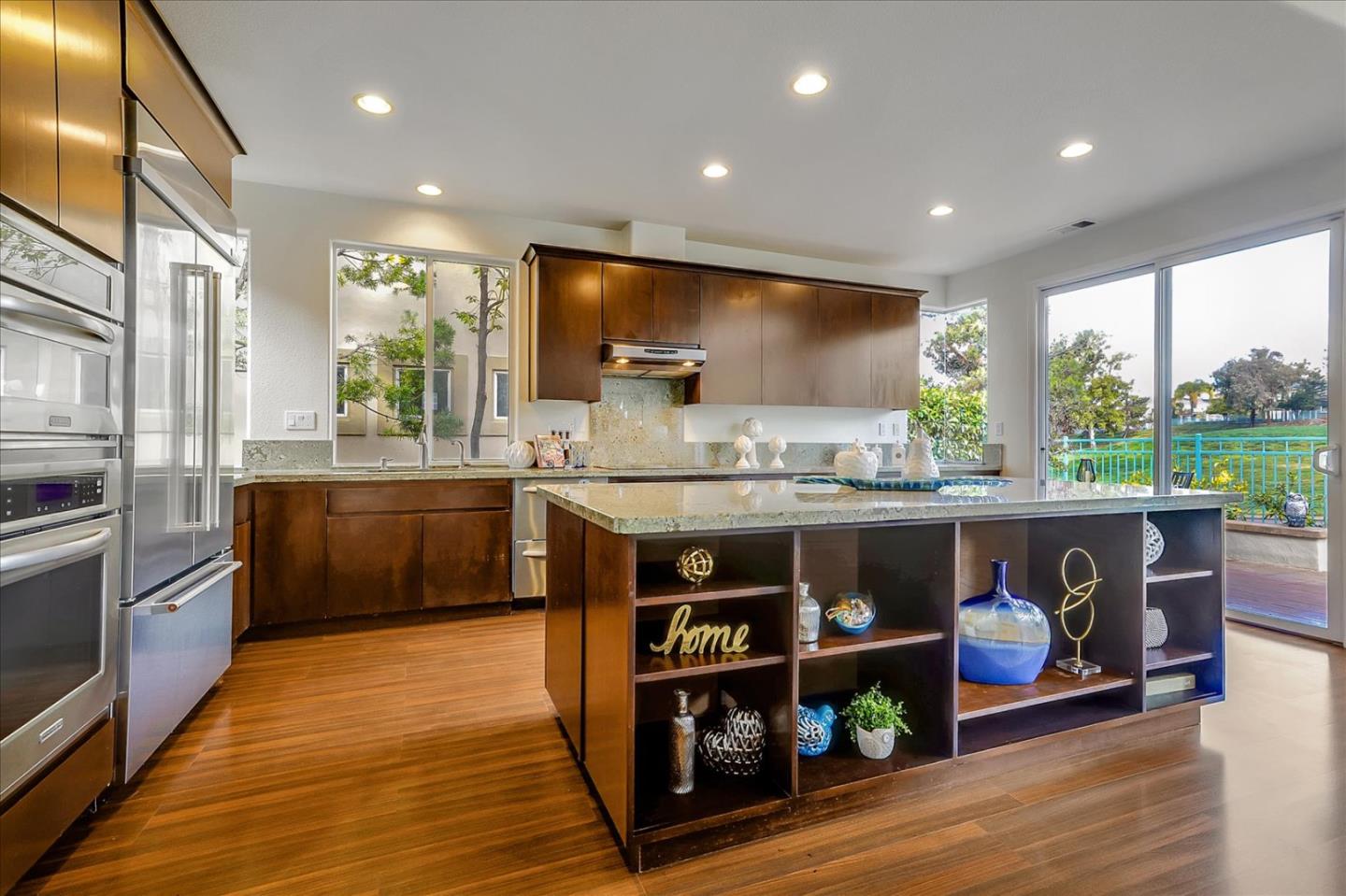5803 Killarney Circle San Jose, CA 95138 - Photo 15 of 57 a kitchen with stainless steel appliances granite countertop a stove a sink and a refrigerator