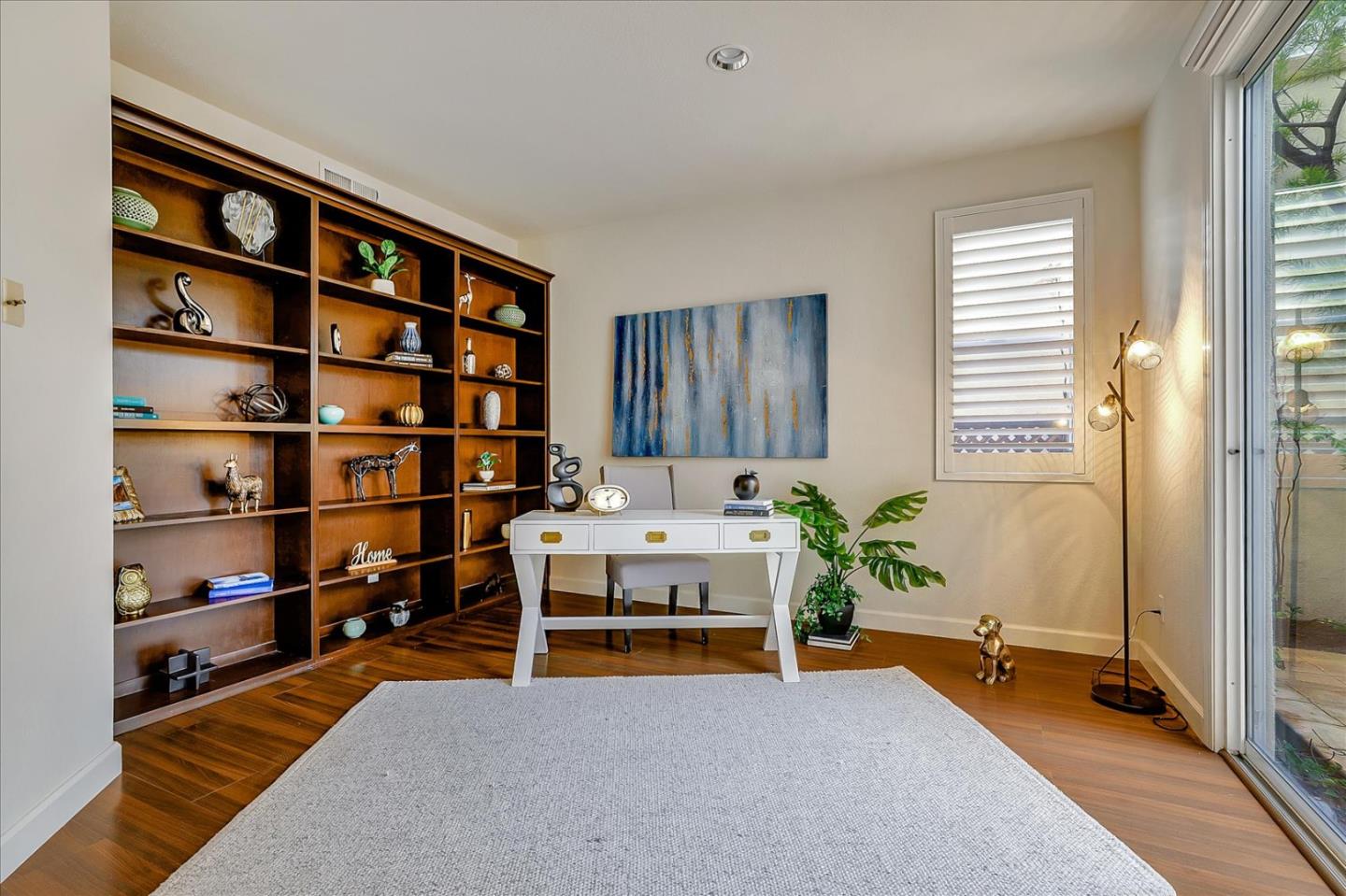 5803 Killarney Circle San Jose, CA 95138 - Photo 22 of 57 a living room with furniture and a book shelf