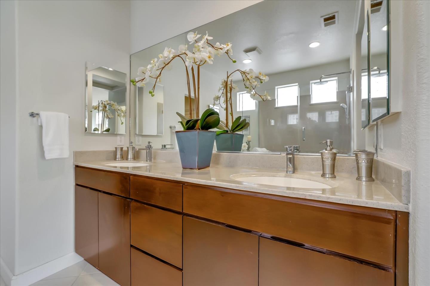 5803 Killarney Circle San Jose, CA 95138 - Photo 29 of 57 a bathroom with a double vanity sink and a mirror