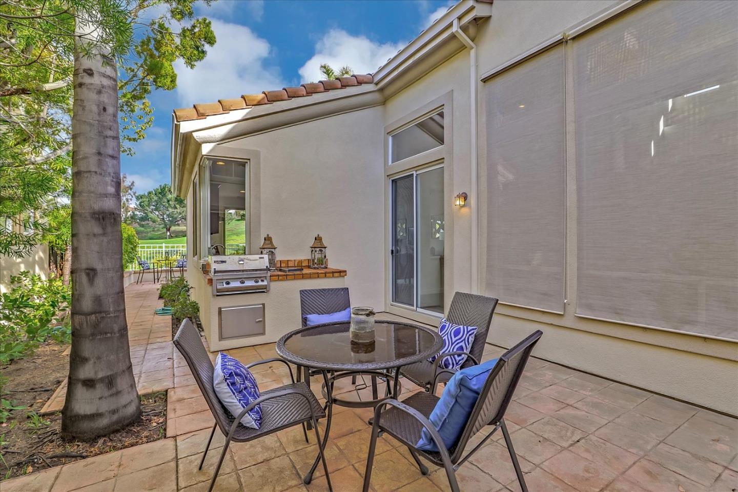 5803 Killarney Circle San Jose, CA 95138 - Photo 50 of 57 a view of an outdoor dining space with a table and chairs