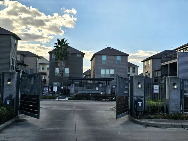 a view of a building with a street