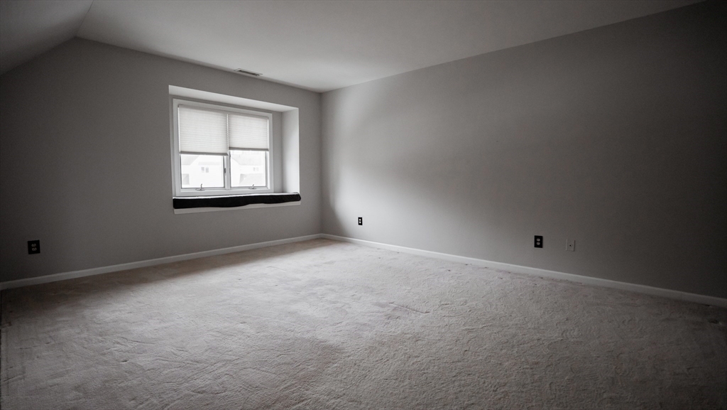 2205 Boston Road, Unit M120 Wilbraham, MA 01095 - Photo 14 of 19 an empty room with a window