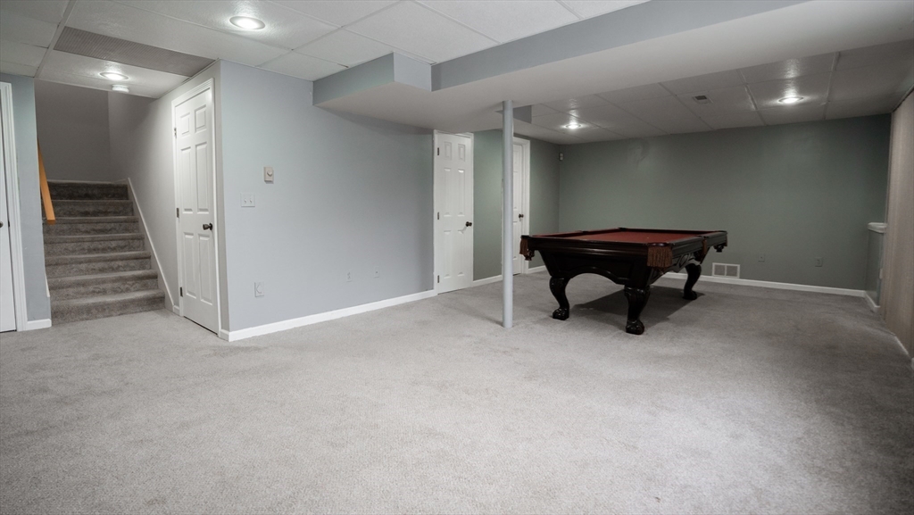 2205 Boston Road, Unit M120 Wilbraham, MA 01095 - Photo 16 of 19 a view of a big room with wooden walls and stairs