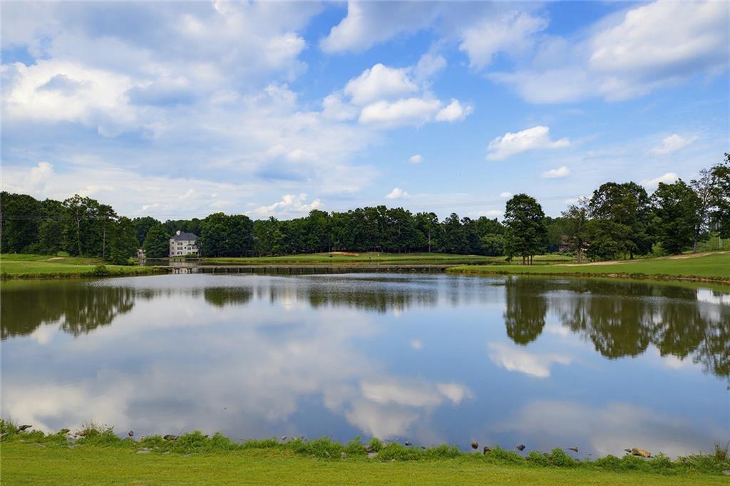 14442 Club Circle Milton, GA 30004 - Photo 72 of 82 a view of a lake with a city view