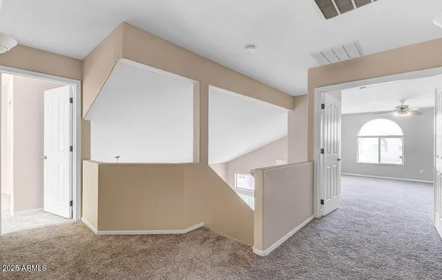 an entryway view with staircase