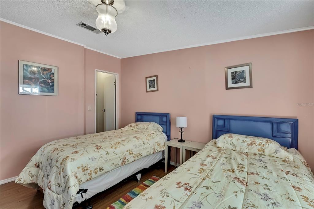 2400 Lemur Drive Holiday, FL 34690 - Photo 31 of 39 a bedroom with bed and a window