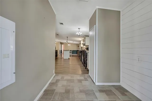 a view of a hallway with a couch