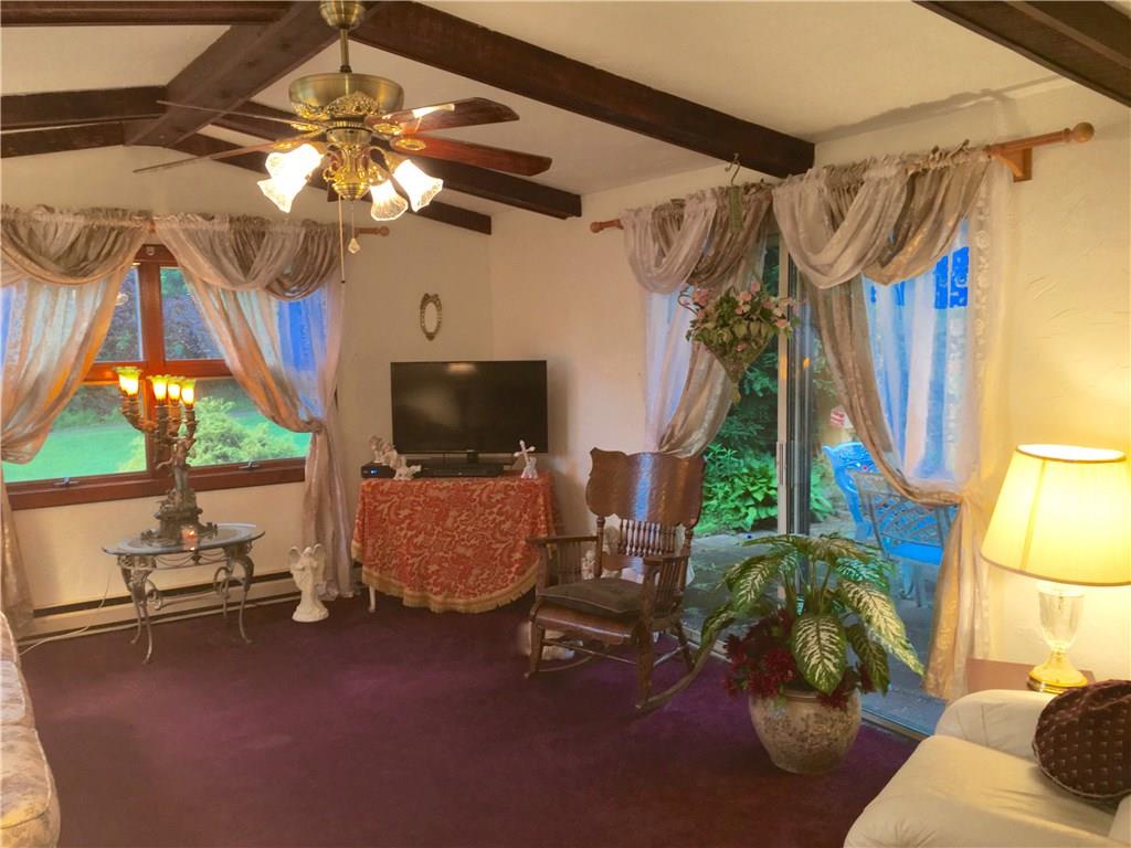 105 Plank Road Acme, PA 15610 - Photo 21 of 25 Again, a vaulted ceiling and ceiling fan in the Living Room!