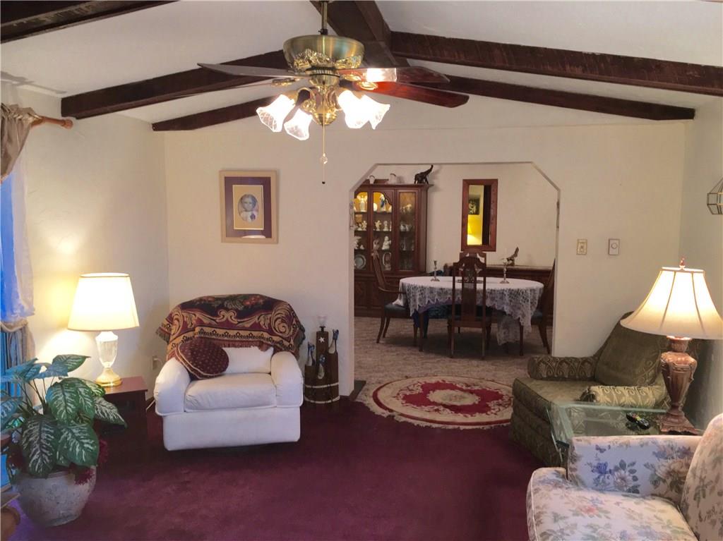105 Plank Road Acme, PA 15610 - Photo 22 of 25 A reverse angle photo from the Living Room into the Dining Room.