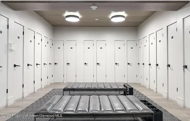 a view of a livingroom with an empty space and wooden floor