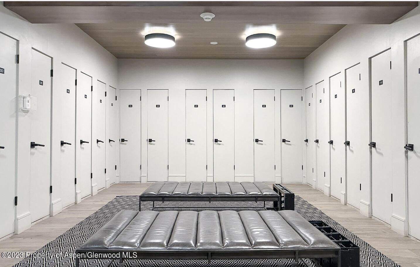 205 East Durant Avenue, Unit 3J Aspen, CO 81611 - Photo 15 of 18 a view of a livingroom with an empty space and wooden floor