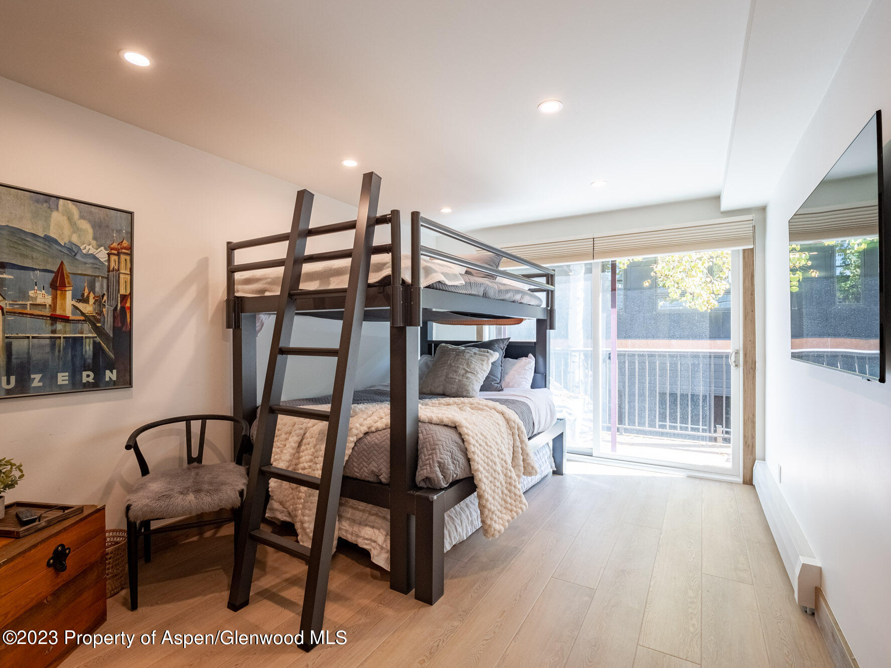 205 East Durant Avenue, Unit 3J Aspen, CO 81611 - Photo 8 of 18 a view of a bedroom with furniture and windows