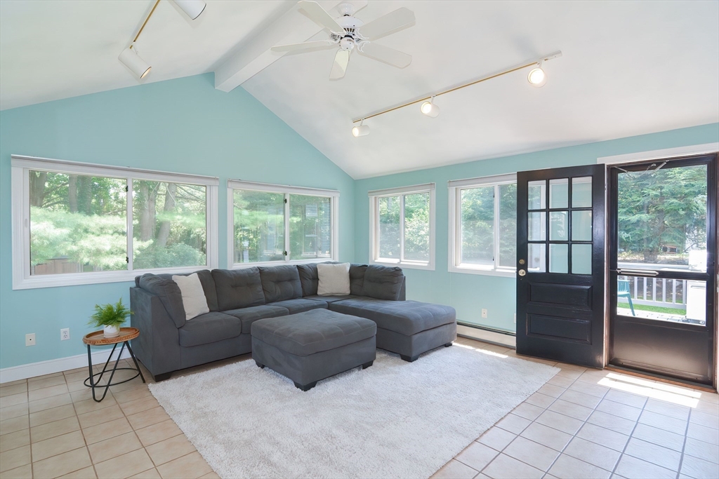 41 Eaton Road Framingham, MA 01701 - Photo 16 of 42 a living room with furniture and a large window