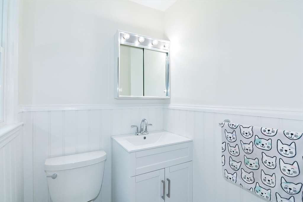 41 Eaton Road Framingham, MA 01701 - Photo 19 of 42 a bathroom with a sink and a mirror