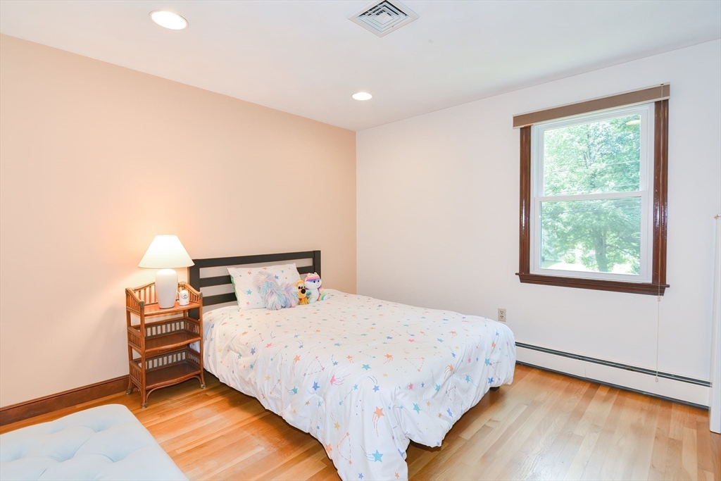 41 Eaton Road Framingham, MA 01701 - Photo 26 of 42 a bedroom with a bed and a window