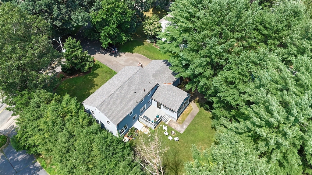 41 Eaton Road Framingham, MA 01701 - Photo 39 of 42 an aerial view of a house with swimming pool and garden space