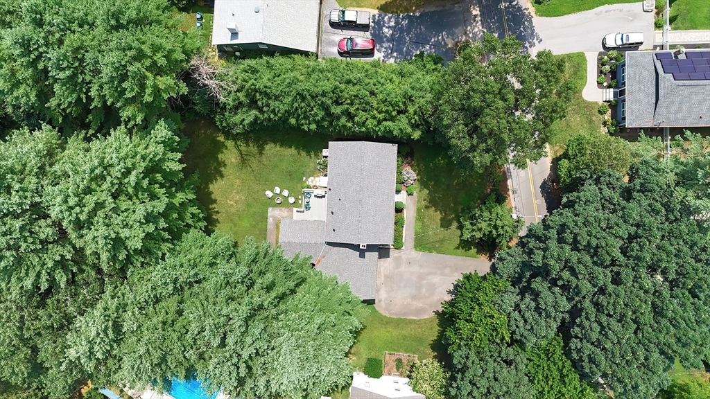 41 Eaton Road Framingham, MA 01701 - Photo 40 of 42 an aerial view of a house with a yard and a garden