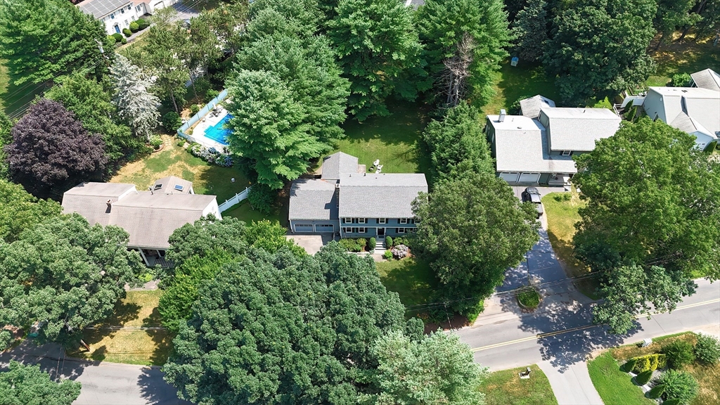 41 Eaton Road Framingham, MA 01701 - Photo 41 of 42 an aerial view of a house with a yard and lake view