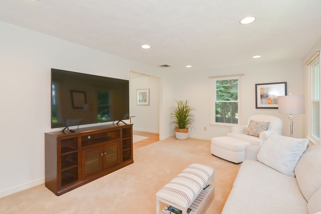 41 Eaton Road Framingham, MA 01701 - Photo 5 of 42 a living room with furniture and a flat screen tv