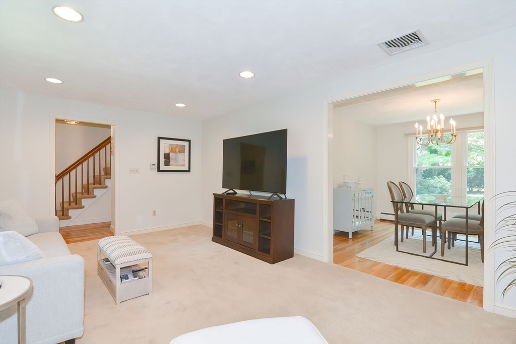 41 Eaton Road Framingham, MA 01701 - Photo 7 of 42 a living room with furniture and a flat screen tv