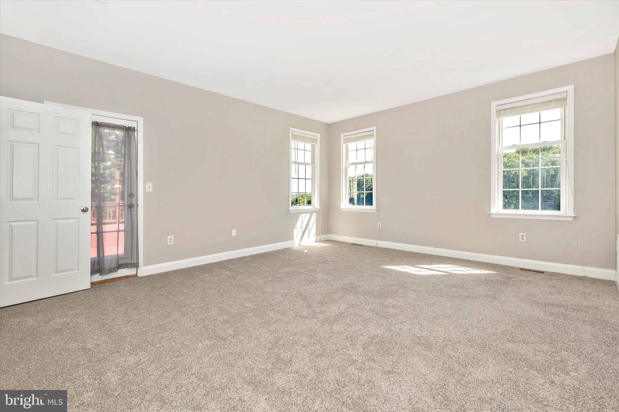 11129 Liberty Road Frederick, MD 21701 - Photo 16 of 44 Primary bedroom with access to back deck and views