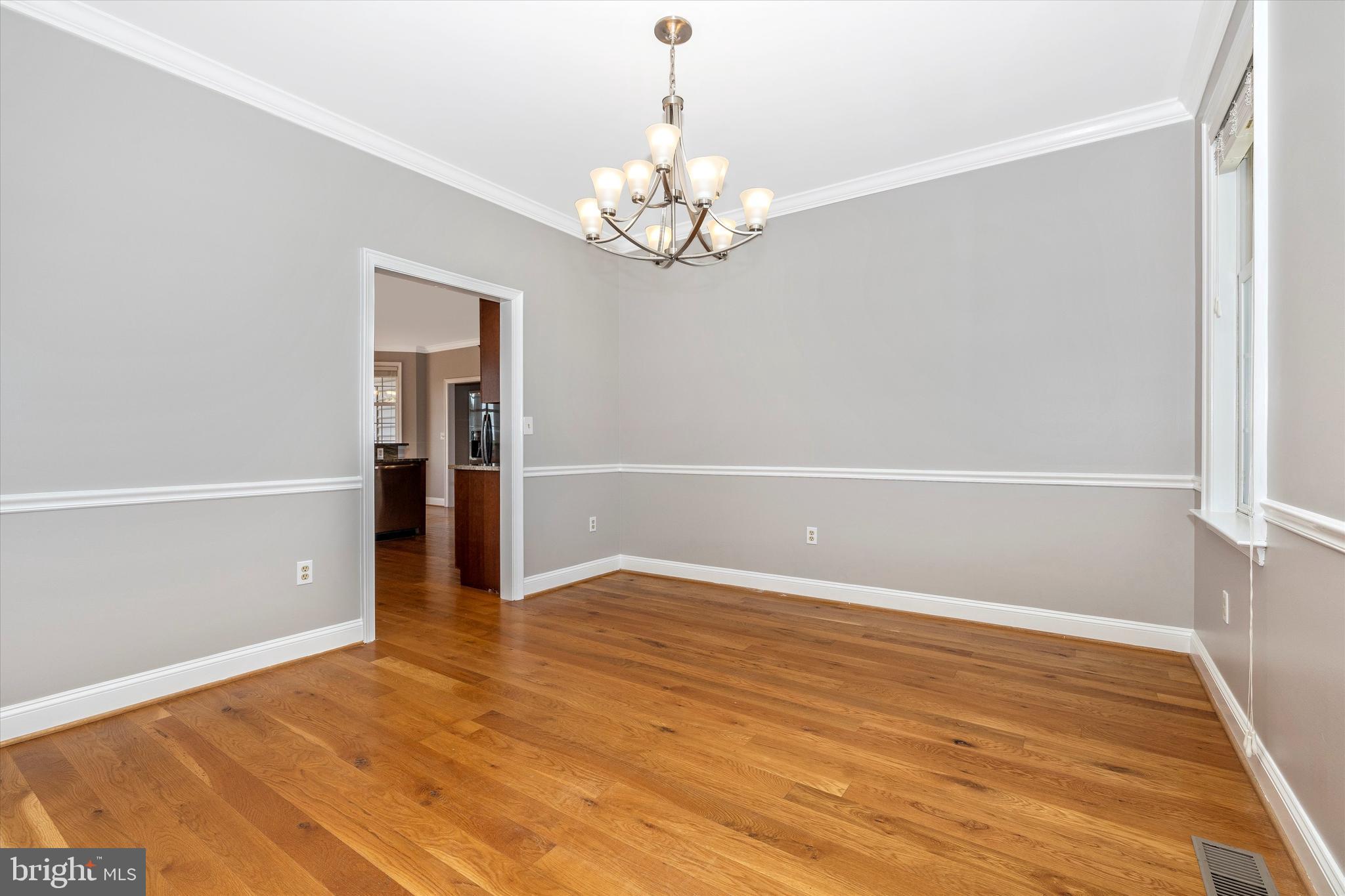 11129 Liberty Road Frederick, MD 21701 - Photo 4 of 44 Dining area chair rail and crown molding