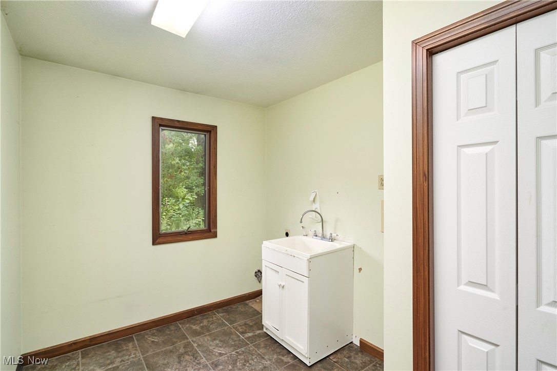 4196 Webb Road Ravenna, OH 44266 - Photo 17 of 29 Main floor Laundry
