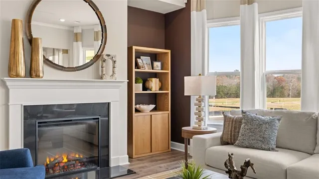 a bedroom with a bed and a lamp on the dresser