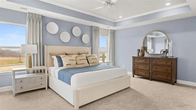 a bedroom with a bed and a painting on the wall