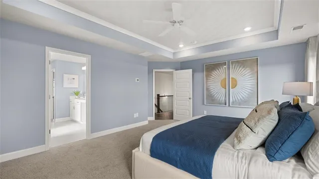 a white bath tub sitting next to a window