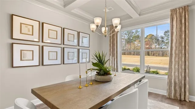 a kitchen with a table and cabinets