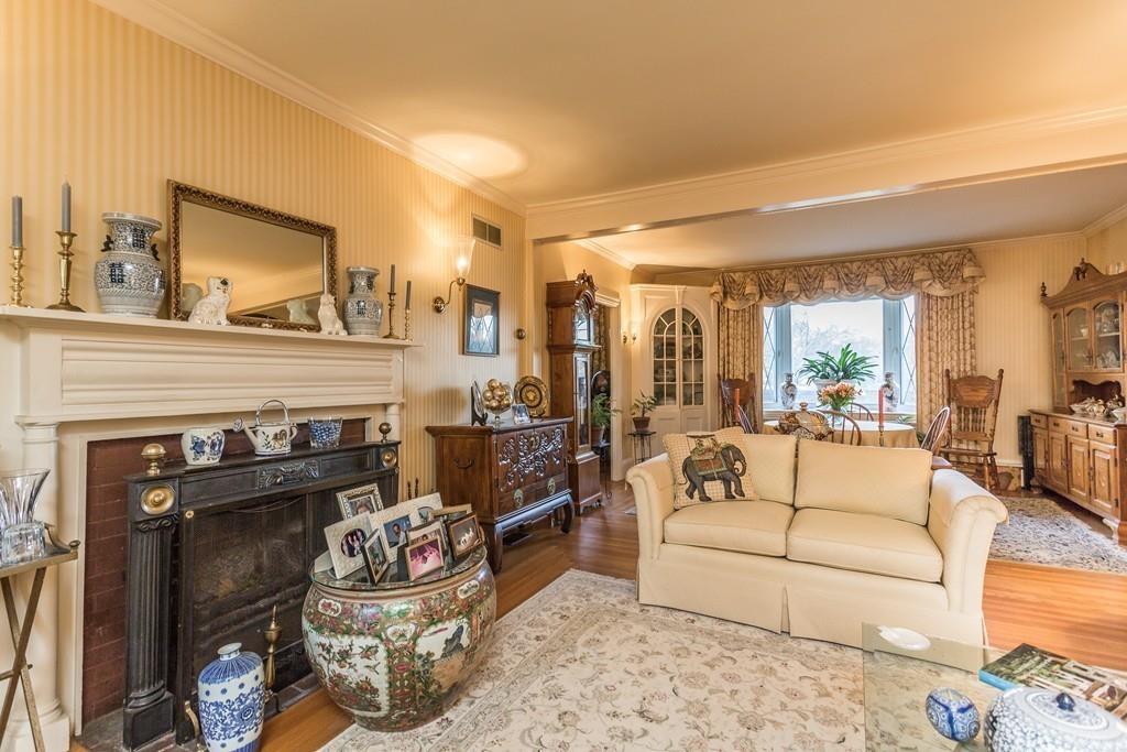 66 Burgess Avenue Rochester, MA 02770 - Photo 15 of 20 a living room with furniture and a fireplace