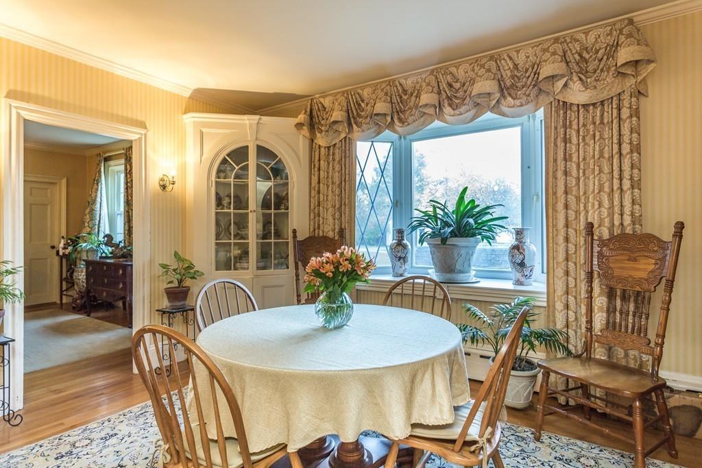 66 Burgess Avenue Rochester, MA 02770 - Photo 17 of 20 a view of a dining room with furniture window and wooden floor
