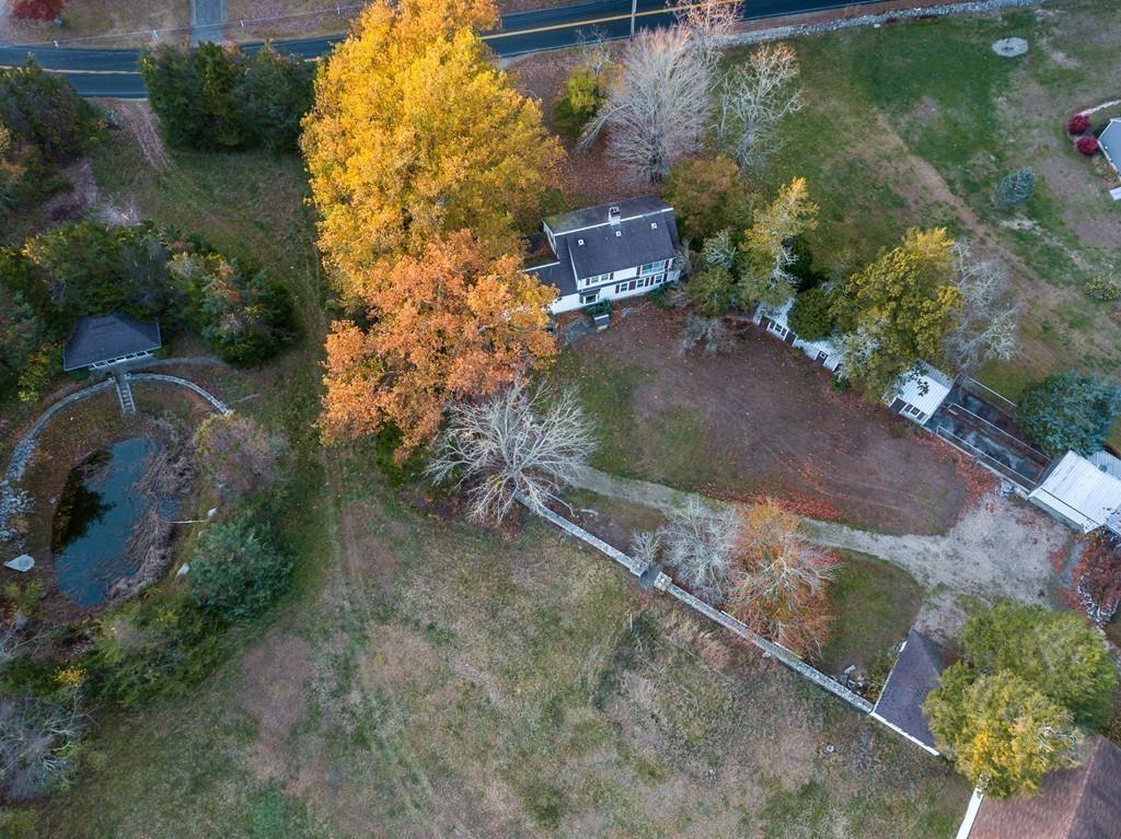 66 Burgess Avenue Rochester, MA 02770 - Photo 4 of 20 an aerial view of a house with a yard