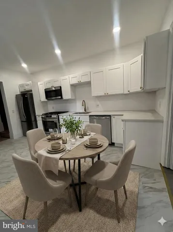 a view of a dining room with furniture