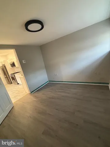 a view of a big room with wooden floor