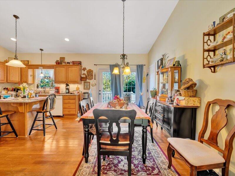 860 Holland Road Callaway, VA 24067 - Photo 11 of 30 a view of a dining room with furniture window and wooden floor