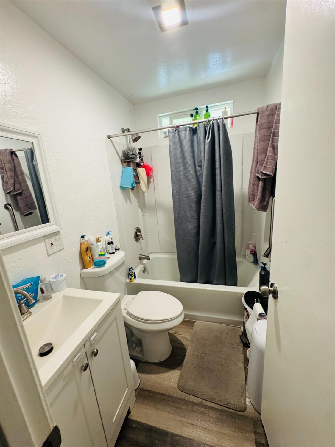 1335 Olive Avenue Sanger, CA 93657 - Photo 24 of 28 a bathroom with a sink toilet and shower