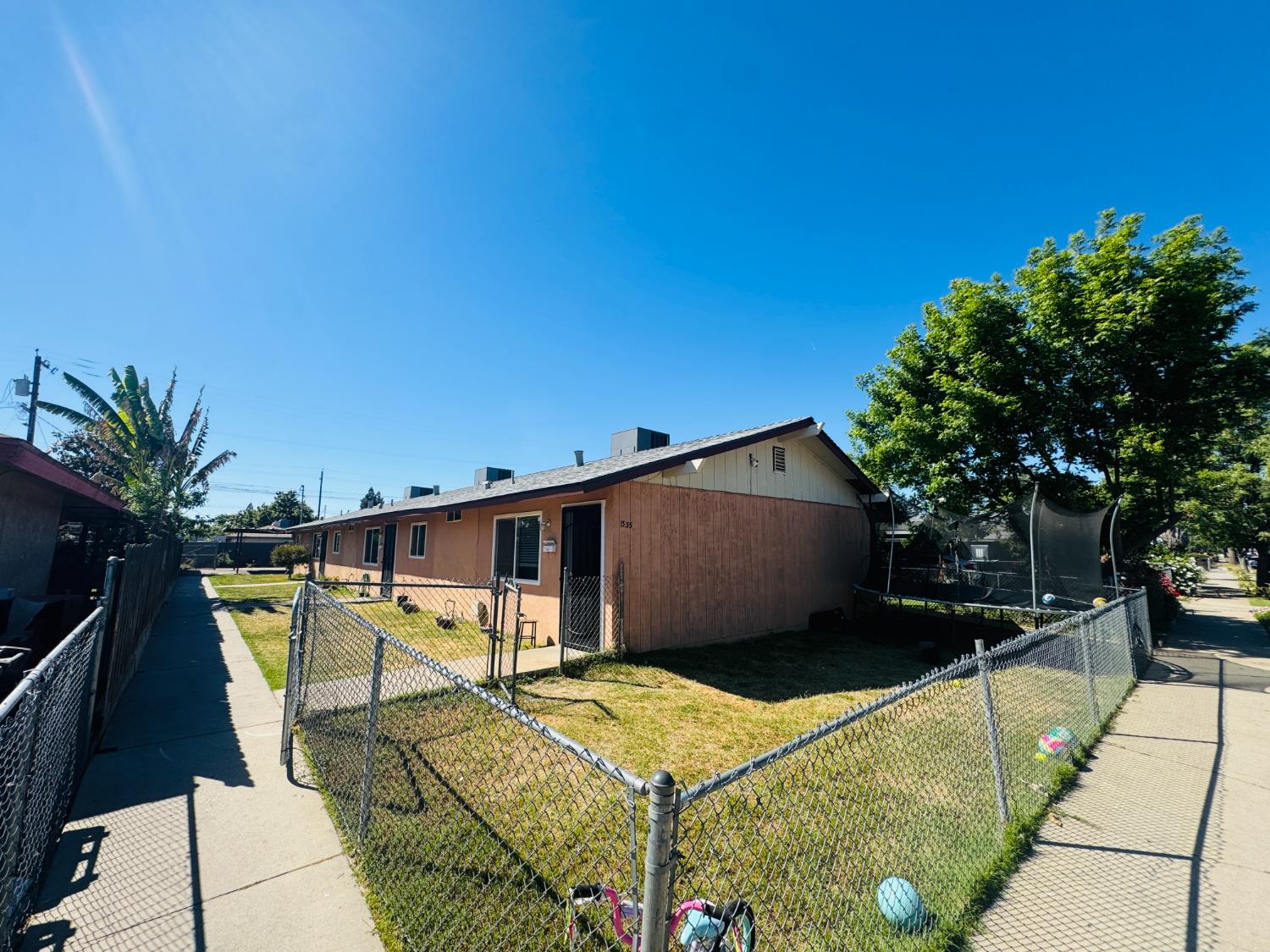 1335 Olive Avenue Sanger, CA 93657 - Photo 5 of 28 a backyard of a house with seating space