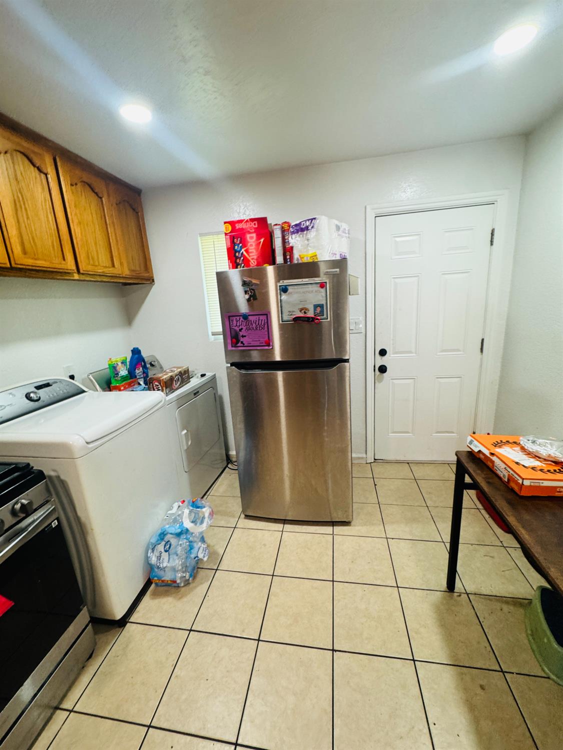1335 Olive Avenue Sanger, CA 93657 - Photo 10 of 28 a storage room with cabinets