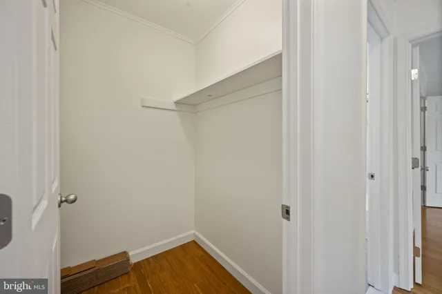 a view of small space with wooden floor