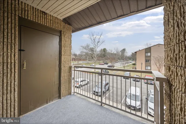 a view of a balcony with city view